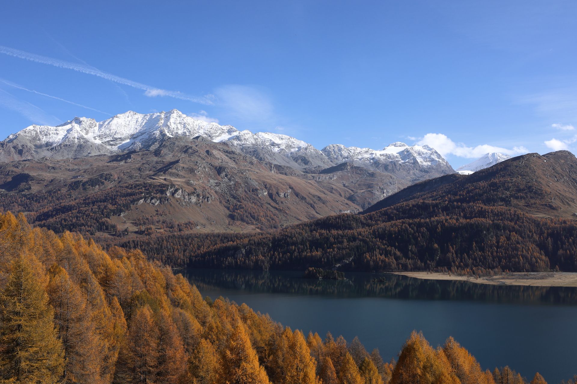 Hiking in the Engadin from Sils to an outlook near Maloja.